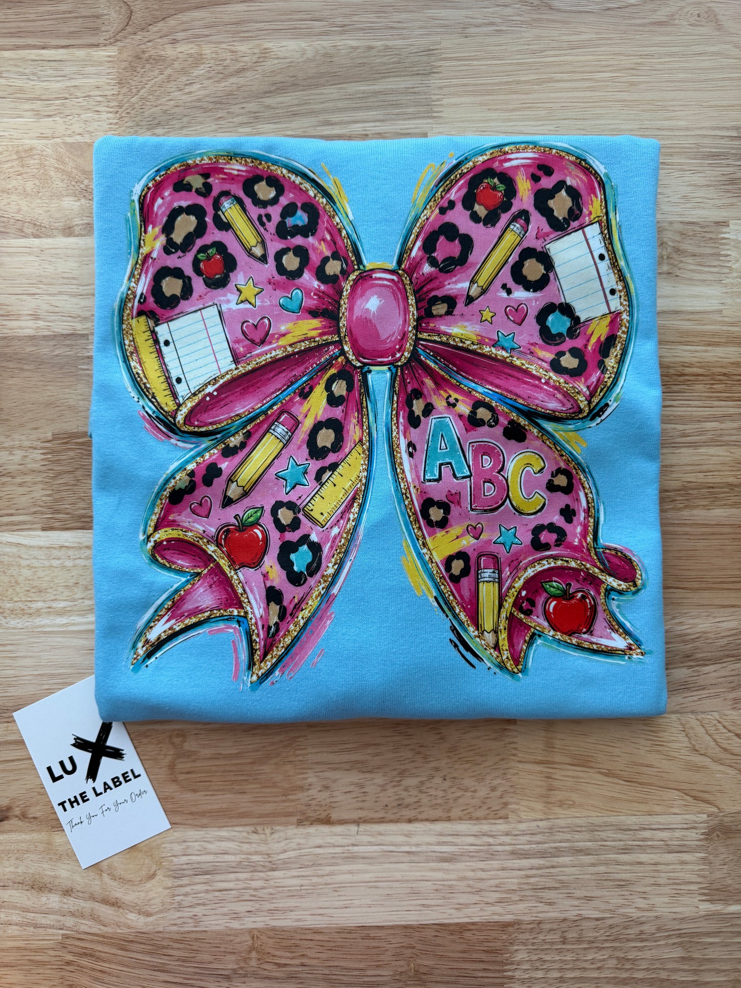 TEACHER EDUCATION BOW T-SHIRT